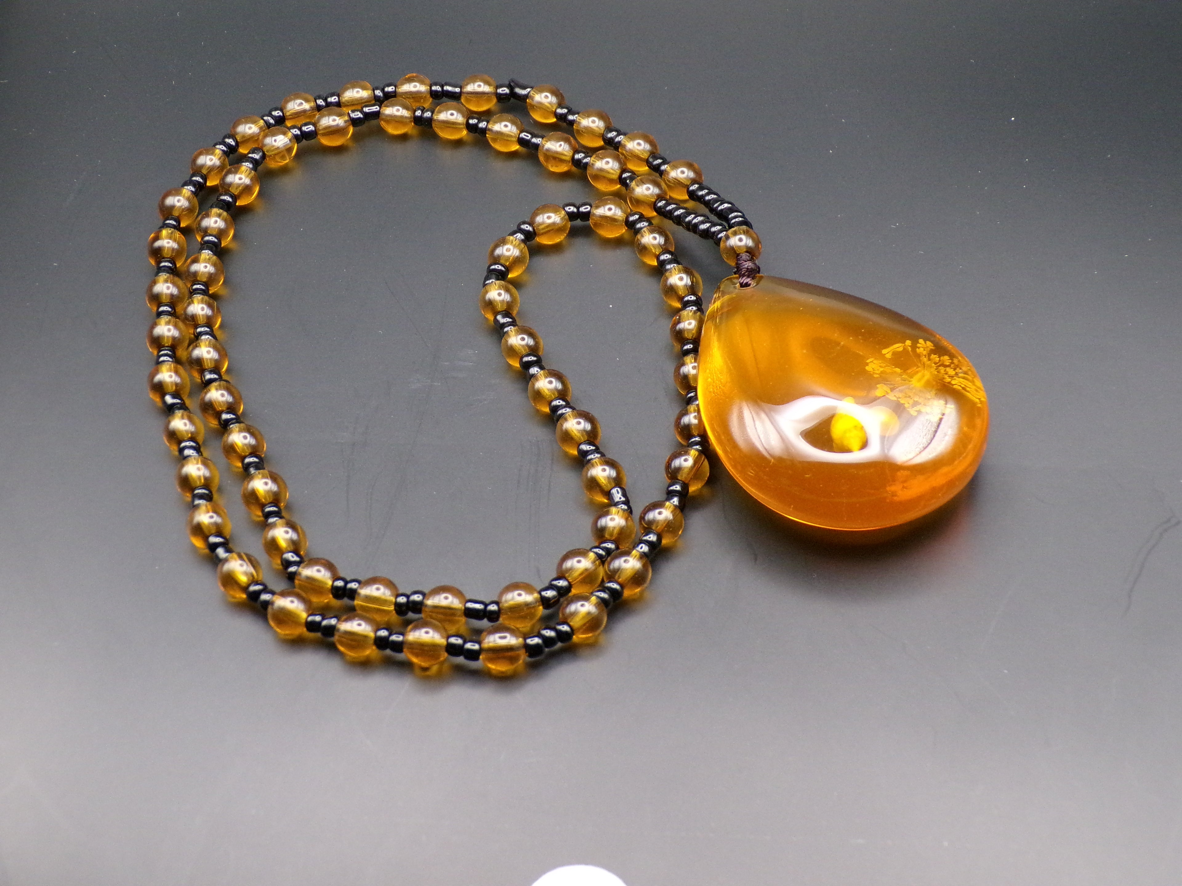 Amber-Tone Bead Necklace with Teardrop Pendant