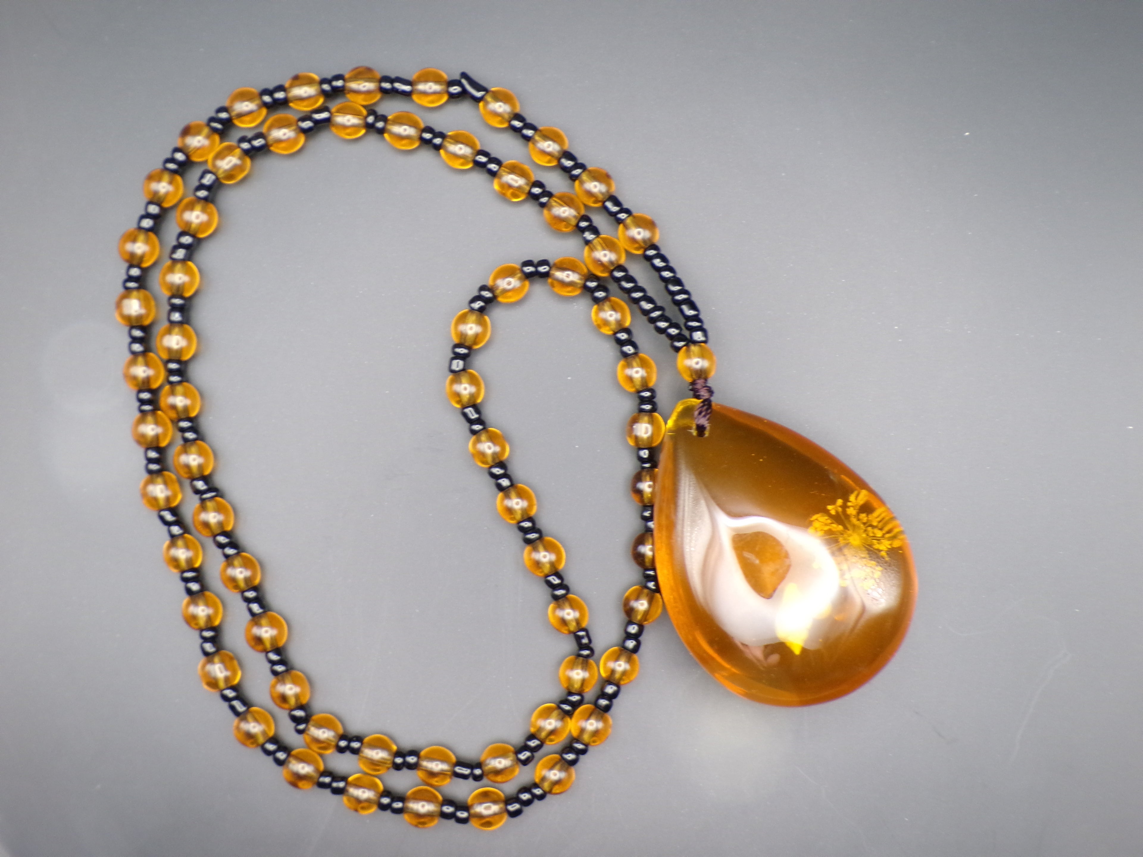 Amber-Tone Bead Necklace with Teardrop Pendant