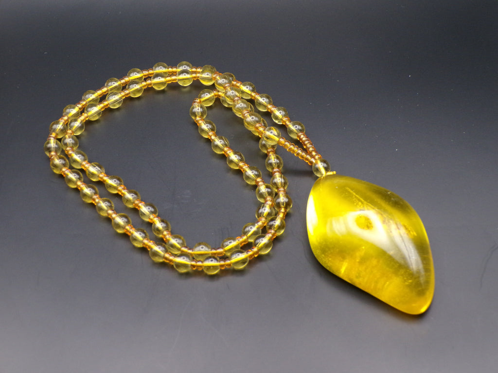 Yellow Bead Necklace with Asymmetrical Amber-Style Pendant