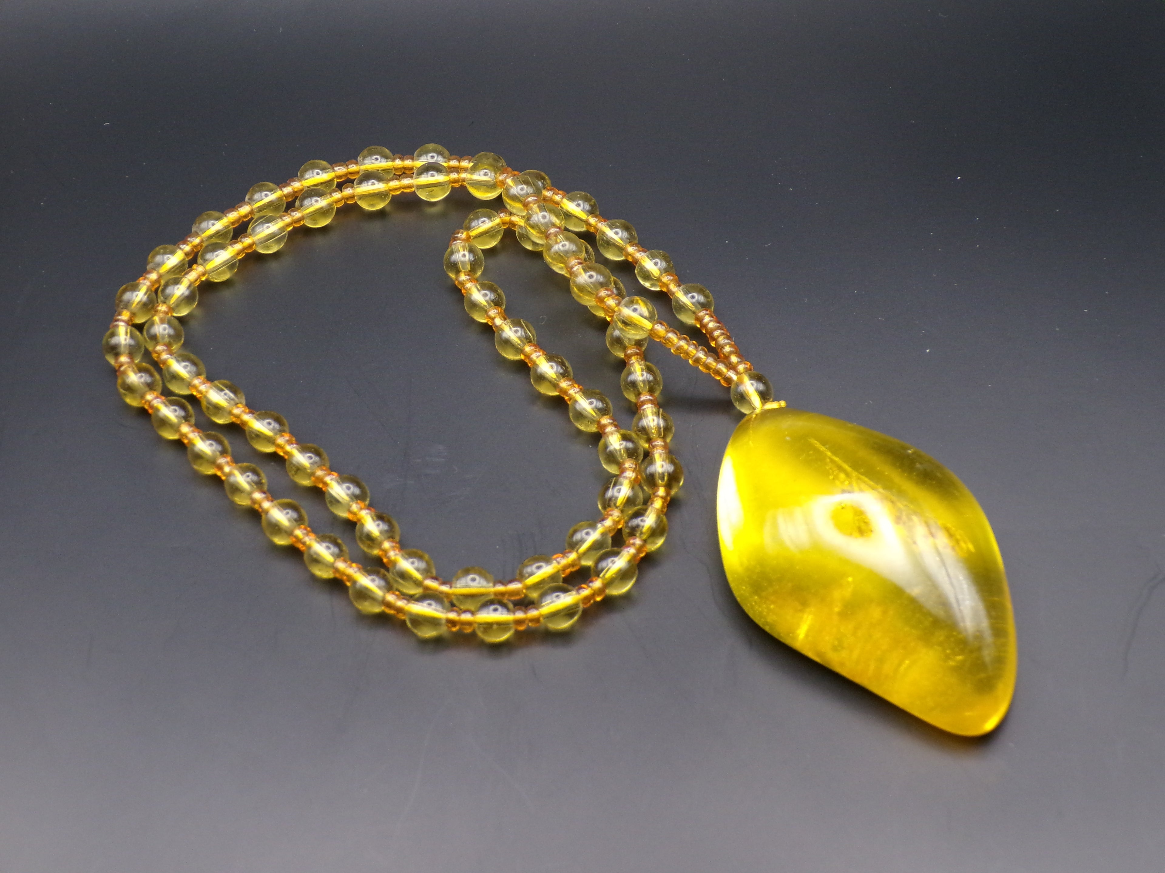 Yellow Bead Necklace with Asymmetrical Amber-Style Pendant