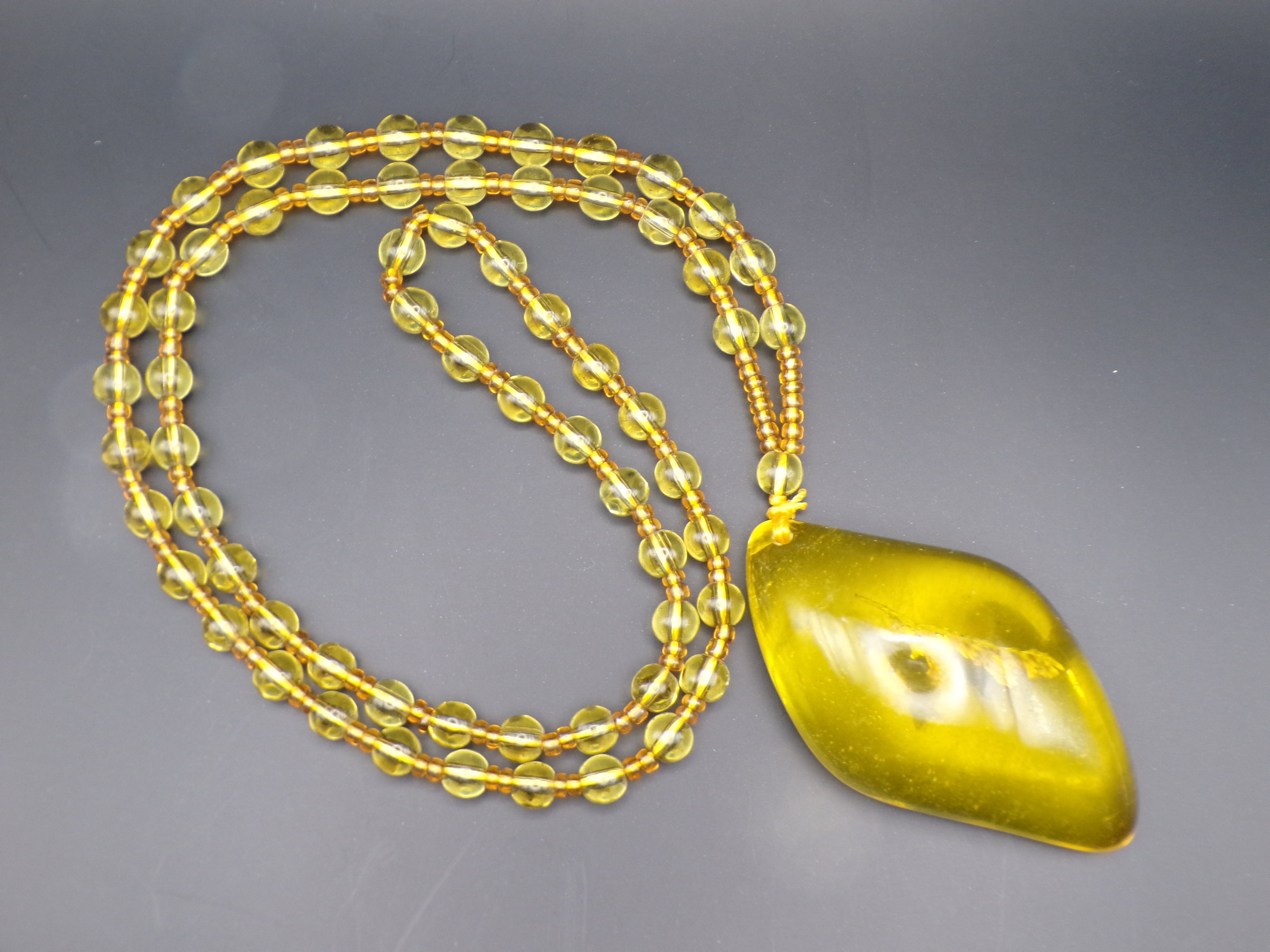 Yellow Bead Necklace with Asymmetrical Amber-Style Pendant