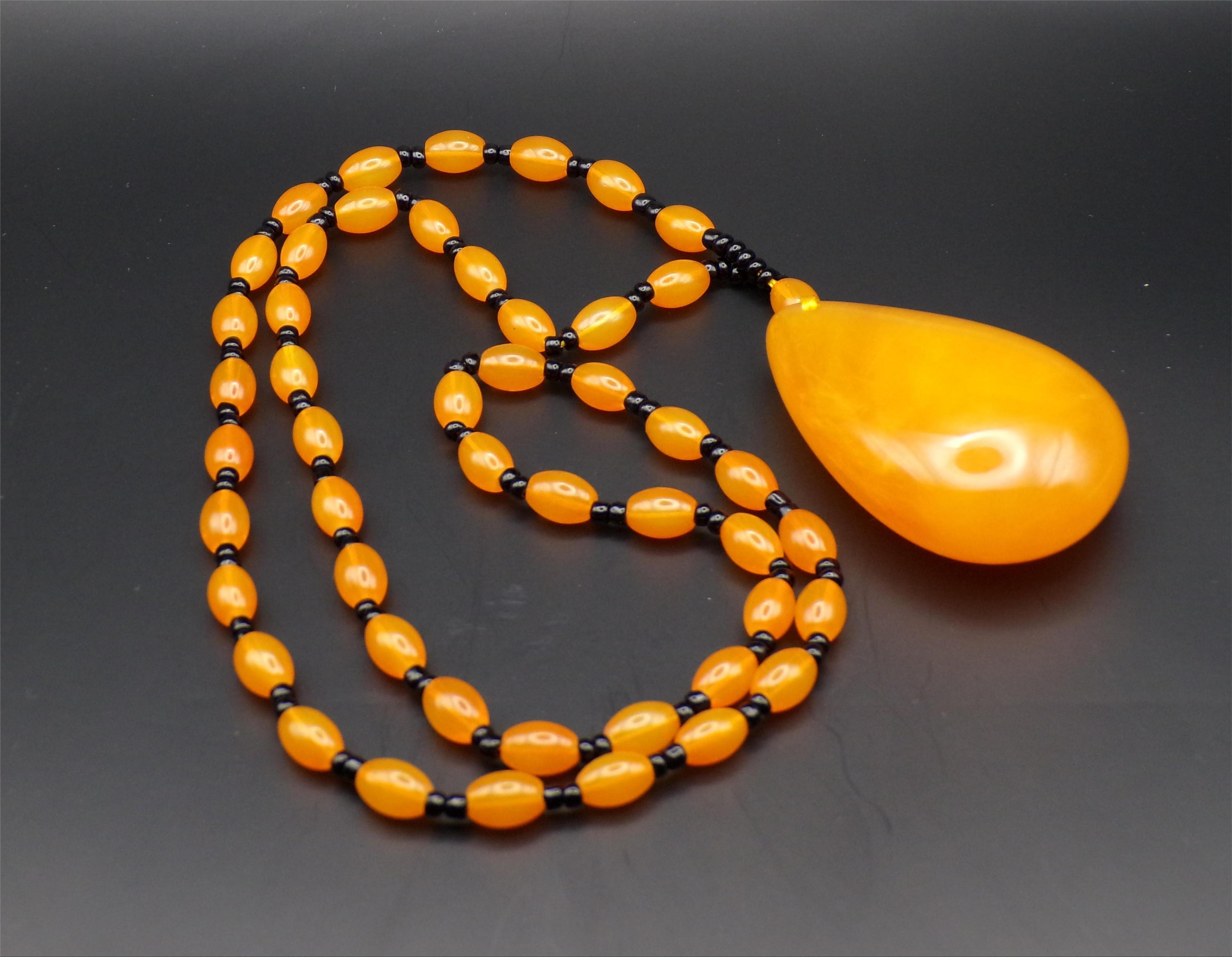 Orange Bead Necklace with Large Teardrop Pendant
