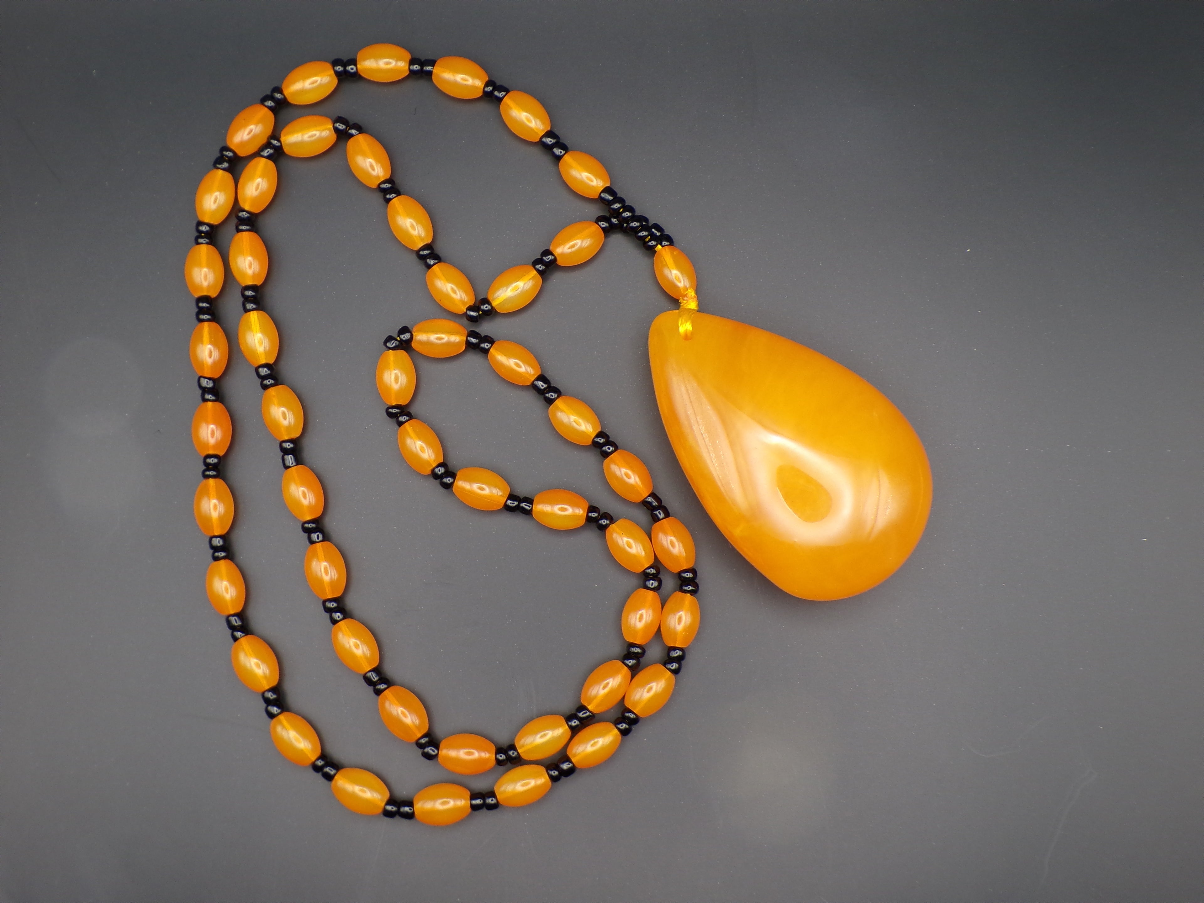 Orange Bead Necklace with Large Teardrop Pendant