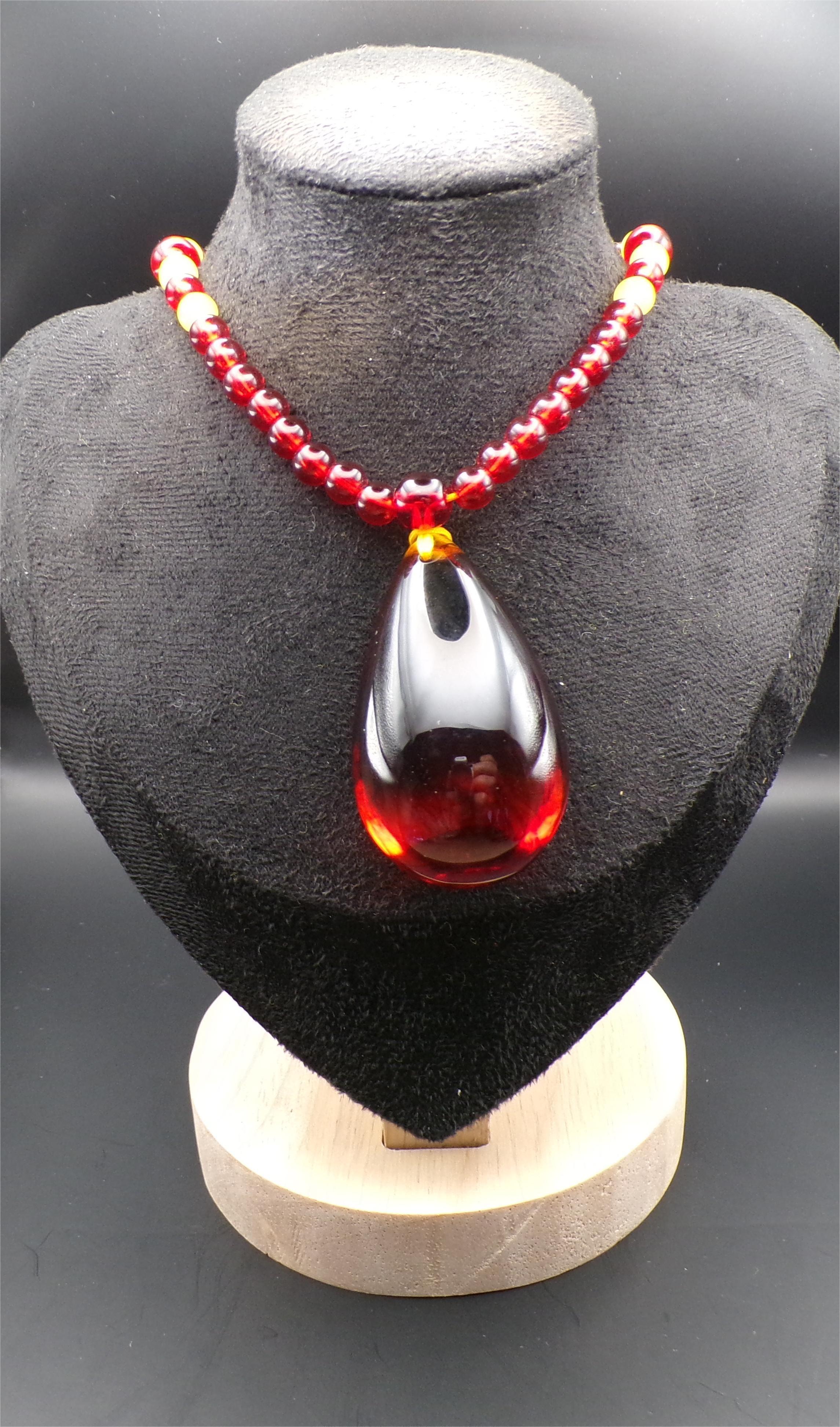 Red Bead Necklace with Dark Teardrop Pendant