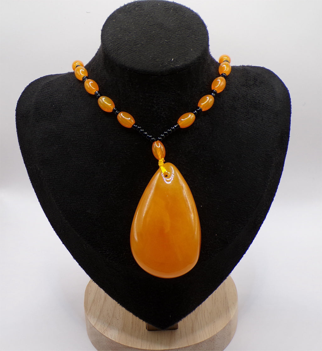 Orange Bead Necklace with Large Teardrop Pendant