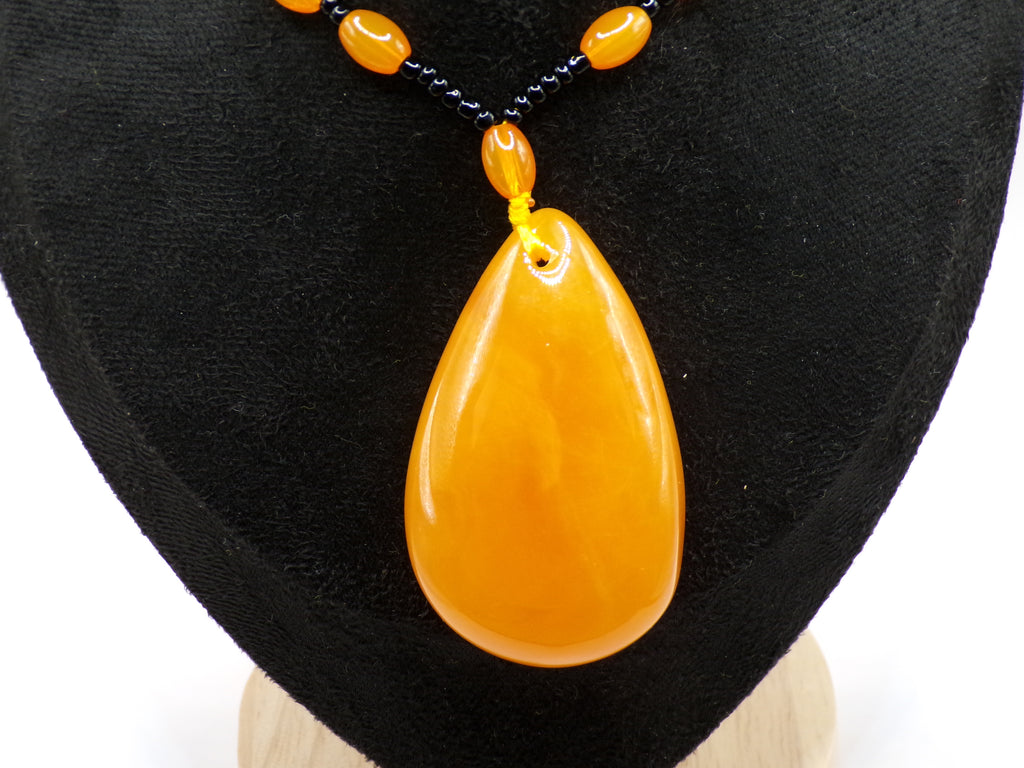 Orange Bead Necklace with Large Teardrop Pendant